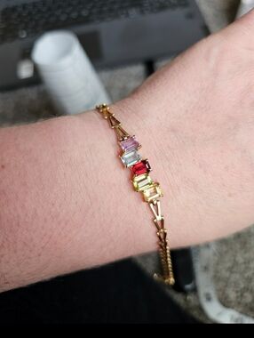 14k gemstone bracelet! Genuine citrine, peridot, garnet, blue topaz, and amethys